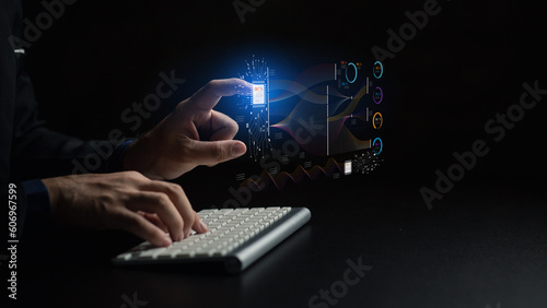 Businessman working with holograms showing business graphs and various information in work, using technology in business management for efficient work and modern business operations.