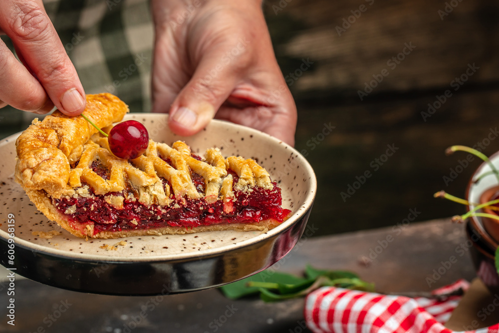 slice of cherry pie, Flaky Crust, piece on a plate and the whole homemade cherry pie, Long banner format. top view