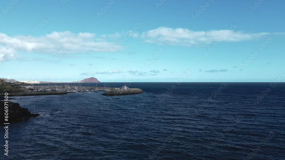 Aerial Dolly Forward of Boats Anchored in a Stone Port, Daytime Aerial Dolly Forward of Boats Anchored in a Stone Port, Daytime