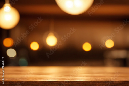 Empty wood table top and blurred coffee shop and restaurant interior background - can used for display or montage your products 