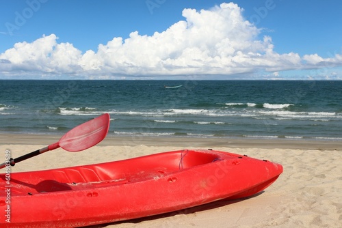 Kayaks on the sandy beach for tourism.