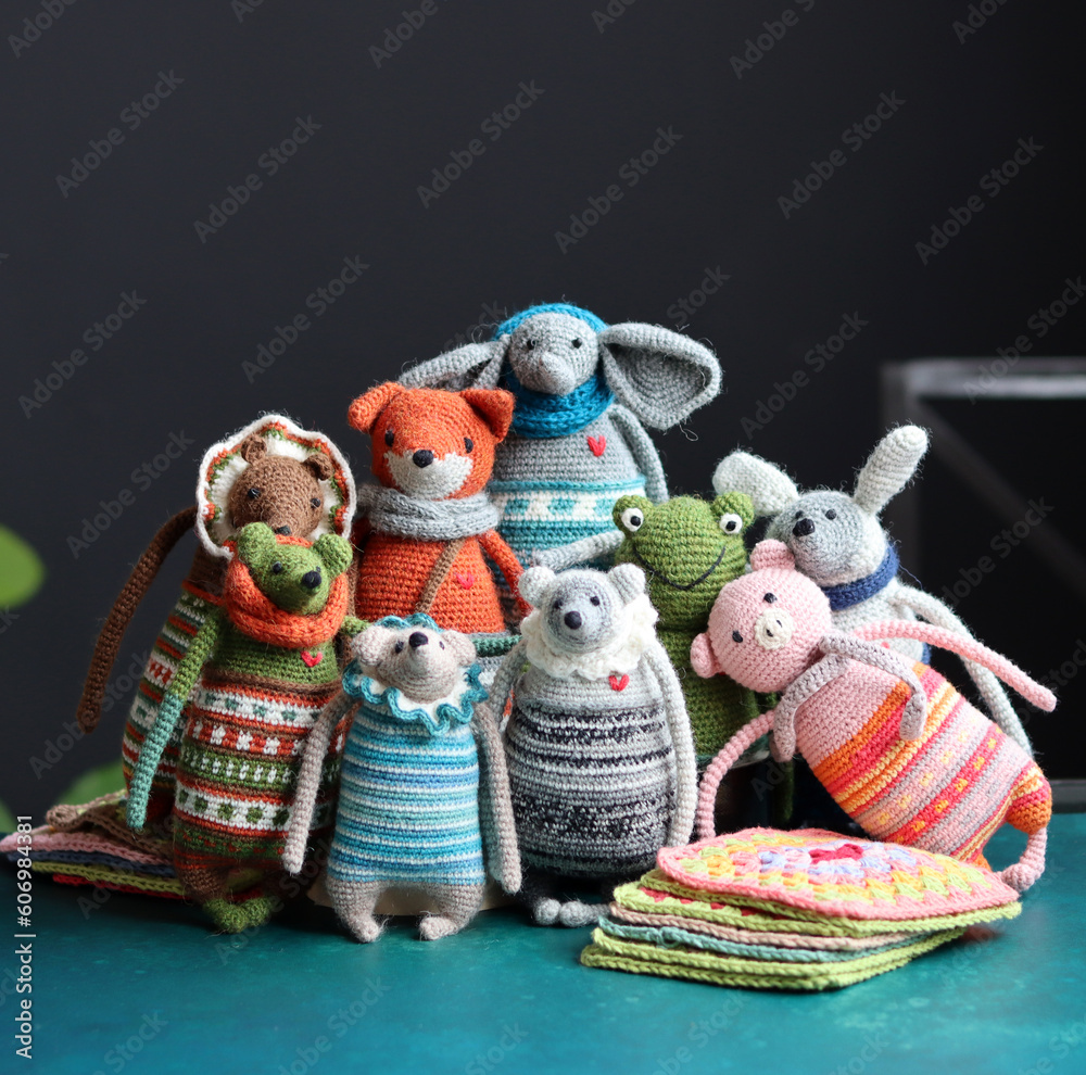 Crochet amigurumi toys made of organic yarn. Eco friendly gift ideas concept. Stuffed animals close up photo.  