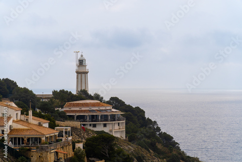 Cabo de la Nao lighthouse on a cliff, in Jávea (Alicante, Spain) photo