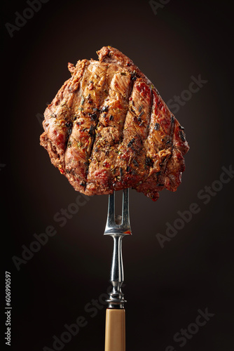  Beef steak on a fork.
