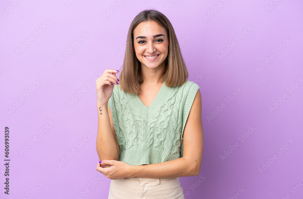 Young caucasian woman isolated on purple background laughing Young caucasian woman isolated on purple background laughing