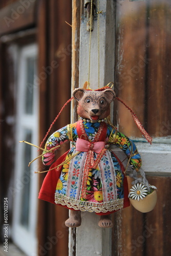 bear doll in a costume