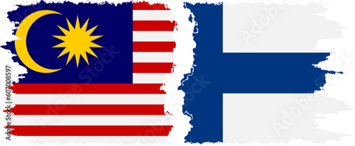 Finland and Malaysia grunge flags connection vector