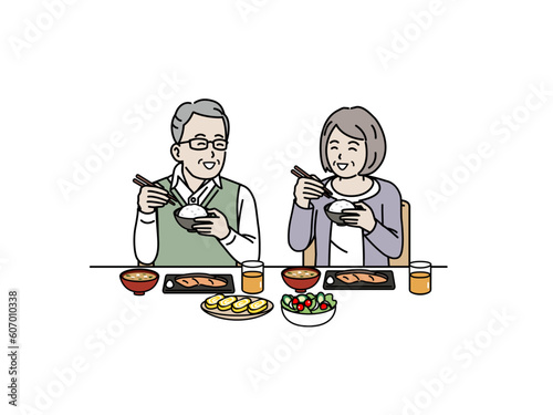 一緒に食事をする老夫婦のイラスト