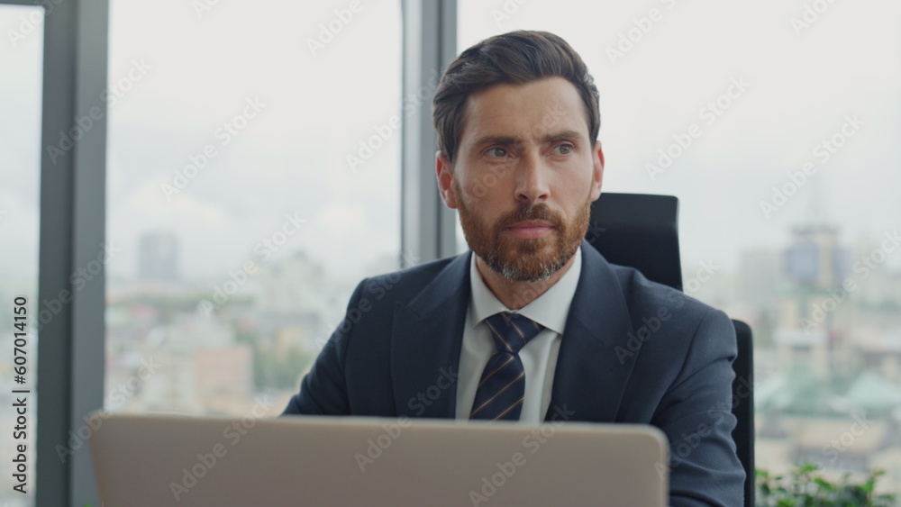 Manager writing work notes in notebook sitting at office close up. Man working. Manager writing work notes in notebook sitting at office close up. Man working.