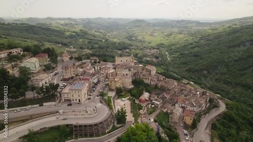 Little typical village up a mountain and green valley in the Abruzzo region of Italy