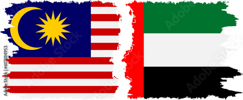 United Arab Emirates and Malaysia grunge flags connection vector