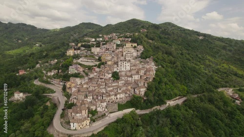 Little typical village up a mountain and green valley in the Abruzzo region of Italy
