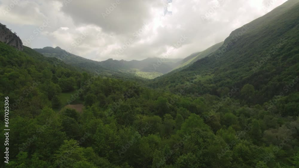 Green valley surrounded by mountains in the Abruzzo region of Italy Green valley surrounded by mountains in the Abruzzo region of Italy