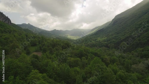 Green valley surrounded by mountains in the Abruzzo region of Italy