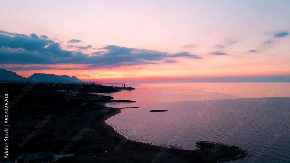 A sunset at the Alagadi Beach in Kyrenia, North Cyprus on sunny day with clear sky A sunset at the Alagadi Beach in Kyrenia, North Cyprus on sunny day with clear sky