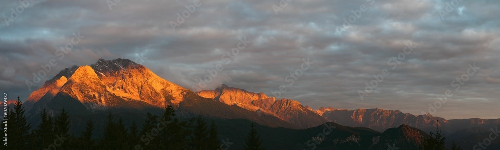 Panoramic view of the Watzmann mountain range at sunrise in Berchtesgaden Bavaria Germany