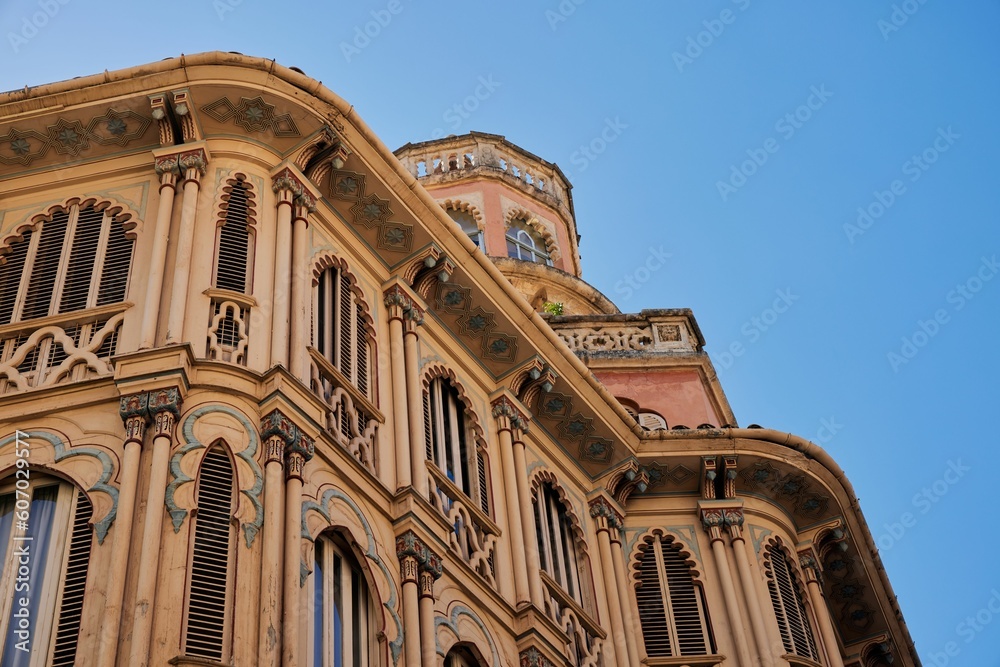 Low angle of Can Corbella Historical landmark in Palma, Spain with blue sky