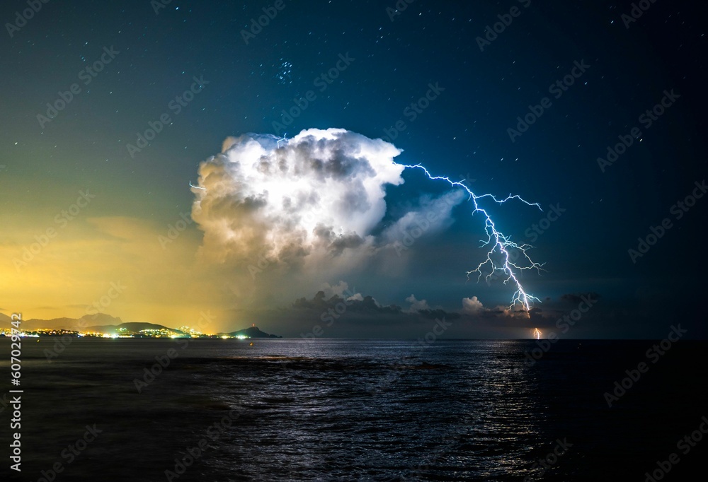 Aerial view of sea during lightning