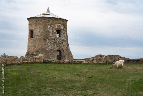 View of the remains of a fortified settlement on the bank of the Kama River - a white stone tower on the Yelabuga (Devil's) settlement on a summer day, Yelabuga, Republic of Tatarstan, Russia