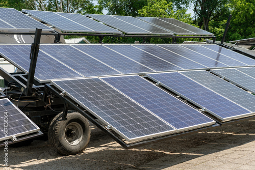 Mobile solar farm, solar energy panels installed on trailer.