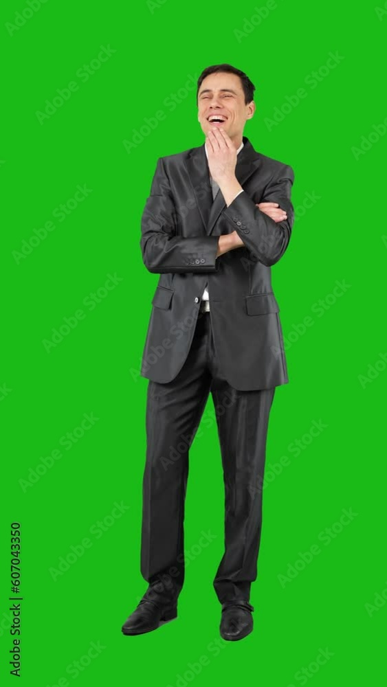 Dreamy businessman touching chin and thinking in studio Dreamy businessman touching chin and thinking in studio