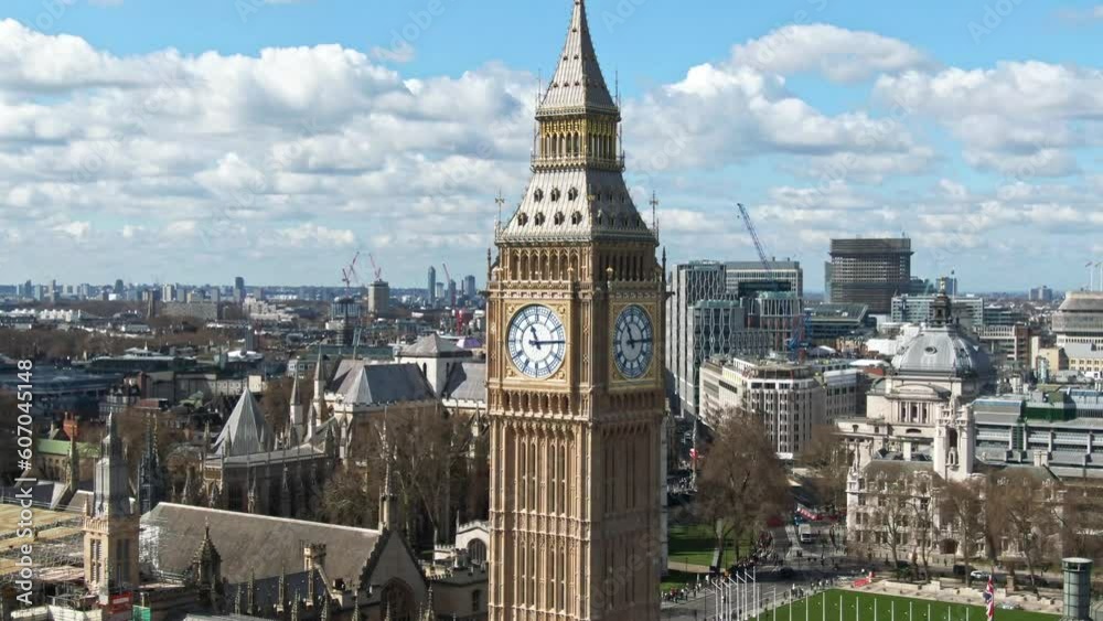 Parallax aerial drone video close up of Big Ben with London in background
