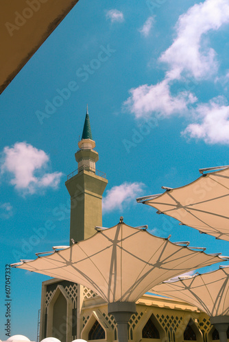 фотографія Islamic, Center Mosque in Balikpapan Indonesia, with Unique Umbrella Canopy that