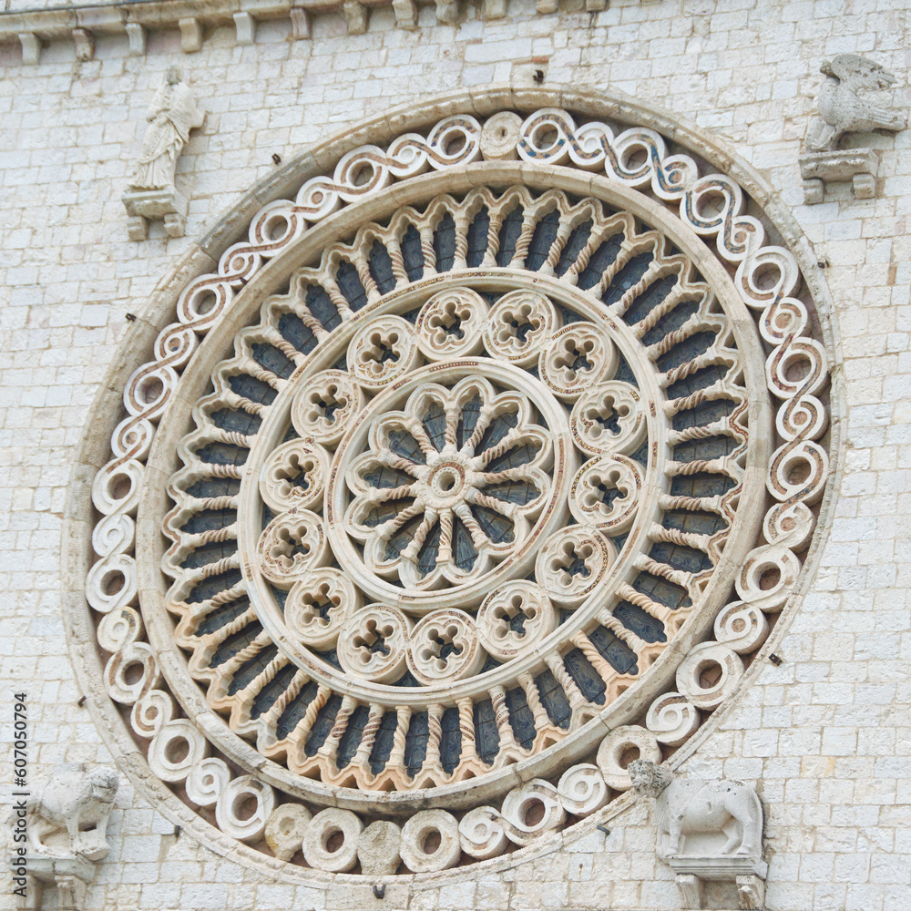 Rose designed window in San Francesco d'Assisi Basilica in Assisi, Italy