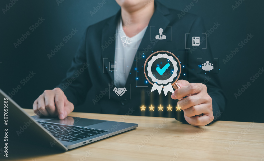 Quality Assurance concept. Businessman showing the sign of leading service. Standard Warranty..ISO certification and global standards concept Quality Assurance concept. Businessman showing the sign of leading service. Standard Warranty..ISO certification and global standards concept