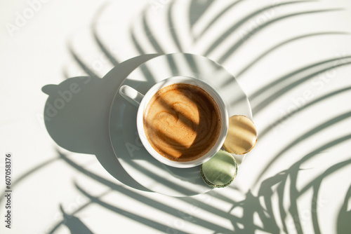Wallpaper Mural Coffee and cakes on the table with plant shadows Torontodigital.ca