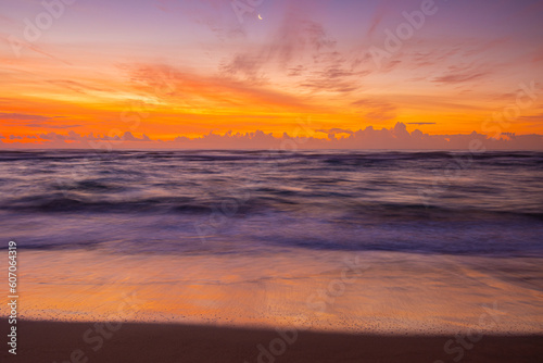 Sunrise on The Waves and The Sandy Shore of Lydgate Beach, Lydgate Beach Park, Kauai, Hawaii, USA