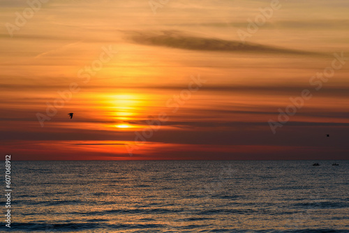 Spectacular bright golden sunset over Baltic sea © Elena Odareeva