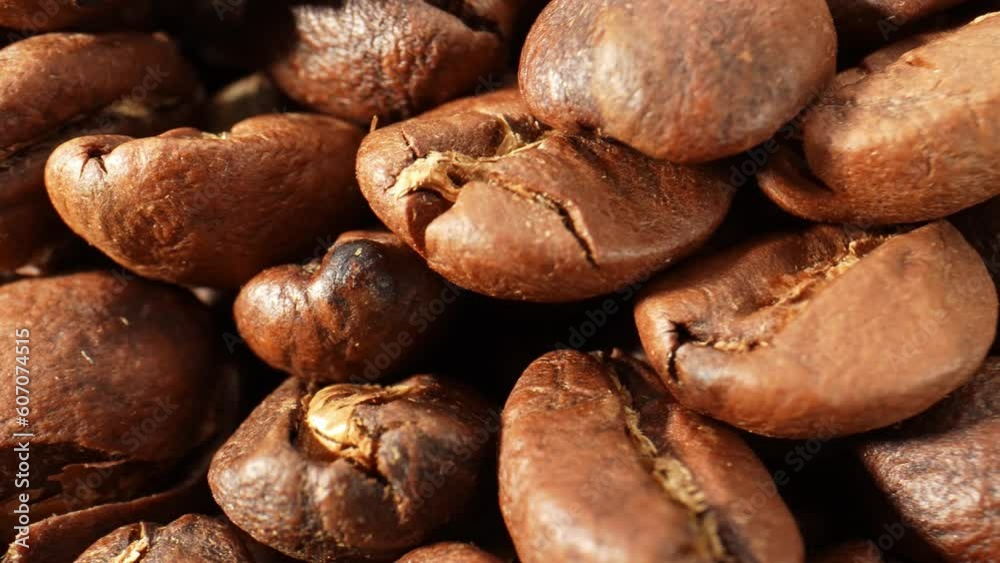 Zooming in on coffee beans reveals a world of exquisite beauty, delicate cracks, glossy sheen, and a tantalizing aroma that hints at the flavors awaiting exploration. Natural raw material background
Zooming in on coffee beans reveals a world of exquisite beauty, delicate cracks, glossy sheen, and a tantalizing aroma that hints at the flavors awaiting exploration. Natural raw material background