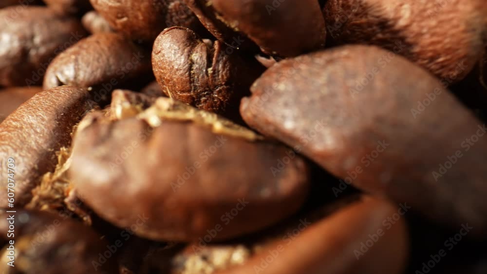 Immerse yourself in a sensory journey as macro videography unveils the hidden beauty of coffee beans, showcasing their delicate patterns and captivating details. Brown background video. 4K
Immerse yourself in a sensory journey as macro videography unveils the hidden beauty of coffee beans, showcasing their delicate patterns and captivating details. Brown background video. 4K
