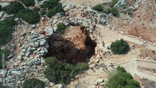 Aerial video over the cliff of Keshet Israel Cave photo