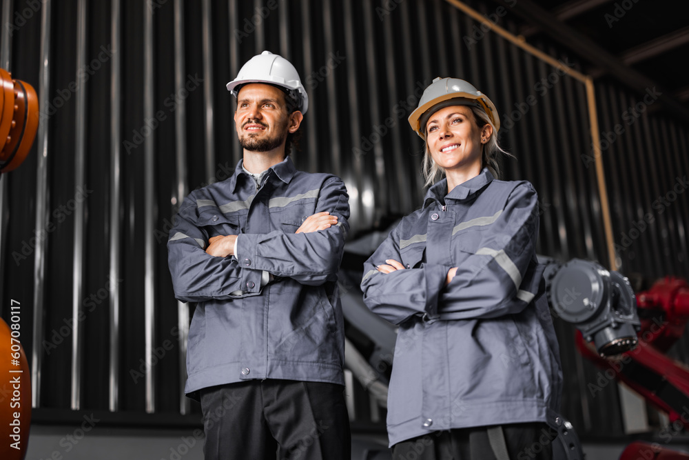 Confident robotic team, including women in non typically male-dominated field, crosses arms representing company's commitment to diversity and inclusion that accepts people all genders and cultures Confident robotic team, including women in non typically male-dominated field, crosses arms representing company's commitment to diversity and inclusion that accepts people all genders and cultures