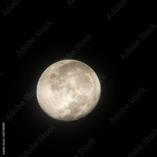 bright moon in a dark night sky