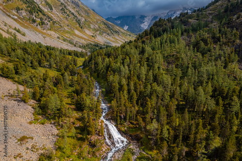 Aerial Landscape beautiful waterfall river around Multinskoye lake in mountains Altai  top view