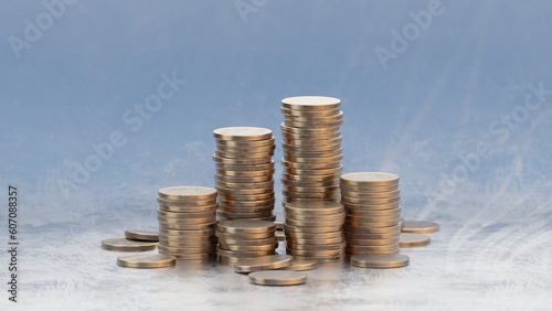Coin stacks, money grow up