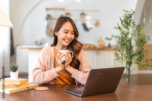 Portrait of asian woman use laptop work digital online marketing internet advertising and sales business technology concept, online marketing, E-business, Ecommerce, Business online at home