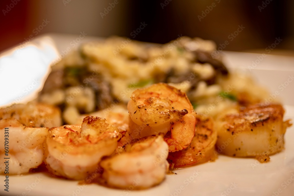 Pan Seared Shrimp served with Scallops and Mushroom and Spinach Risotto