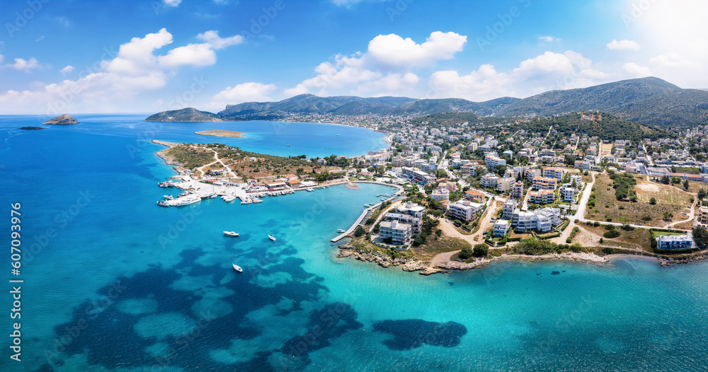 Panoramic aerial view of the beautiful town and bay of Porto Rafti, popular destination for Athenians during summer time, Attica, Greece