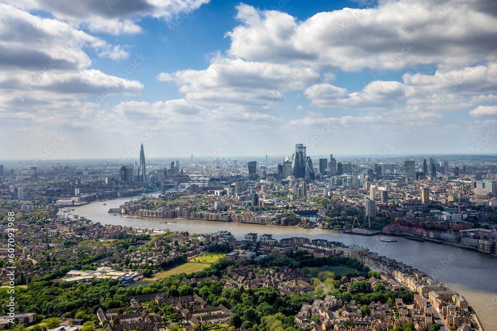 Panorama of the London skyline along the river Thames from London Bridge until the City during a sunny day, United Kingdom 