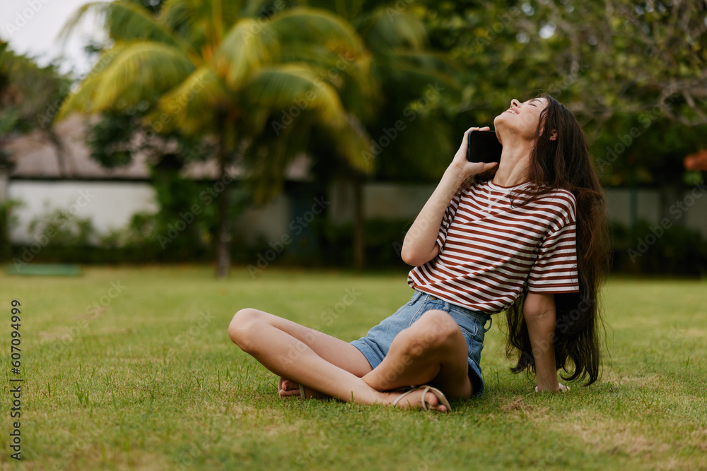woman park nature smiling grass palm call happy blogger tree phone lifestyle woman park nature smiling grass palm call happy blogger tree phone lifestyle