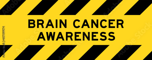 Yellow and black color with line striped label banner with word brain cancer awareness