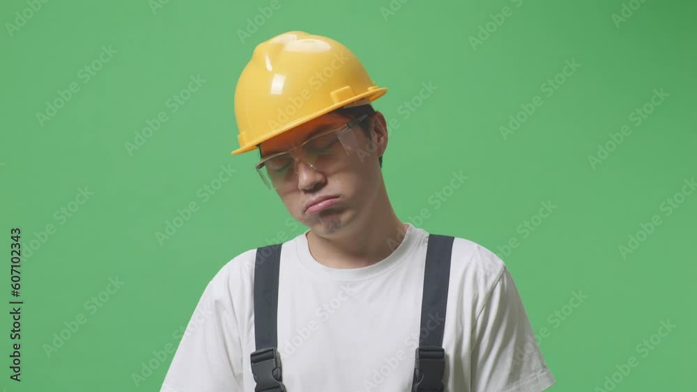 Close Up Of Asian Man Worker Wearing Goggles And Safety Helmet Wiping The Sweat And Being Tired While Standing In The Green Screen Background Studio
Close Up Of Asian Man Worker Wearing Goggles And Safety Helmet Wiping The Sweat And Being Tired While Standing In The Green Screen Background Studio