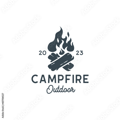 Vintage Burning bonfire with a large flame for camping logo design.