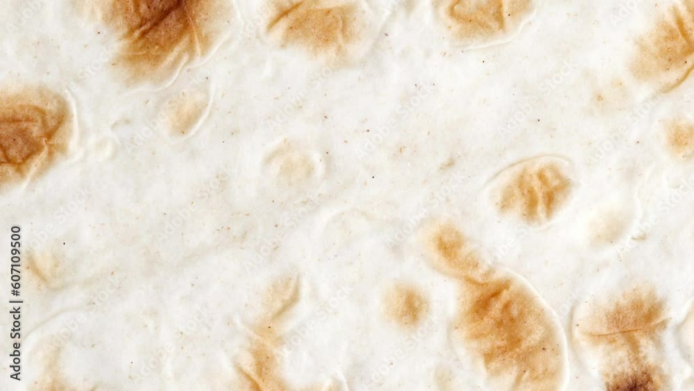 Pita flat close-up rotating, turning, macro, top view
Pita flat close-up rotating, turning, macro, top view