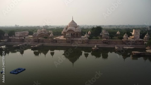 drone filming at sunset, sacred place kusum sarovar on govardhan hill, temple in india, place of pilgrimage photo