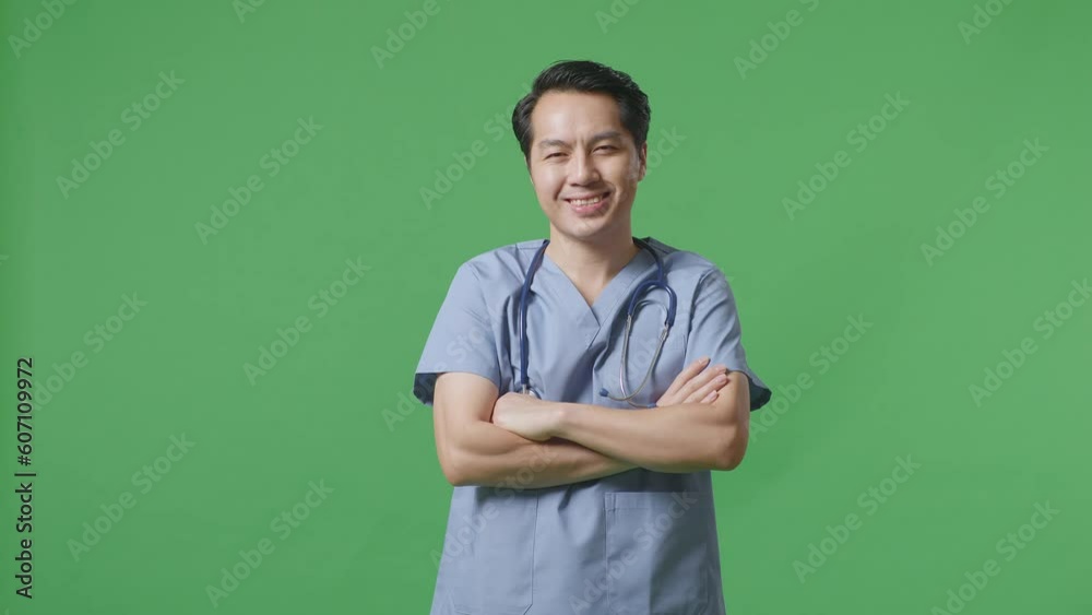 Asian Male Doctor With Stethoscope Crossing His Arms And Smiling On Green Screen Background In The Hospital
Asian Male Doctor With Stethoscope Crossing His Arms And Smiling On Green Screen Background In The Hospital